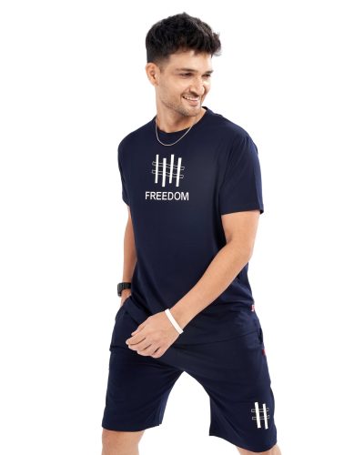 Model showcasing Men's Navy Blue Casual Short Set with Freedom print in a casual setting